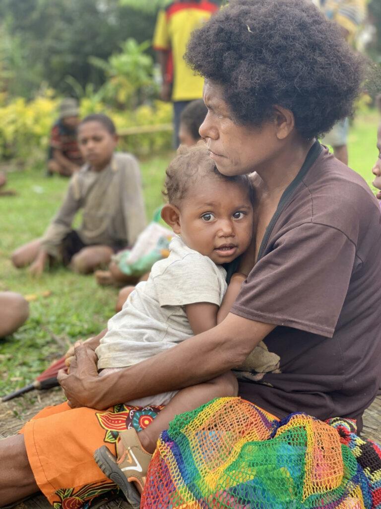 A mother and her baby at Seremore Village, Rai Coast